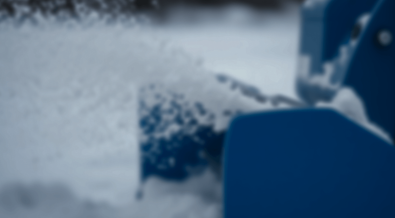 A blurred image of snow blower